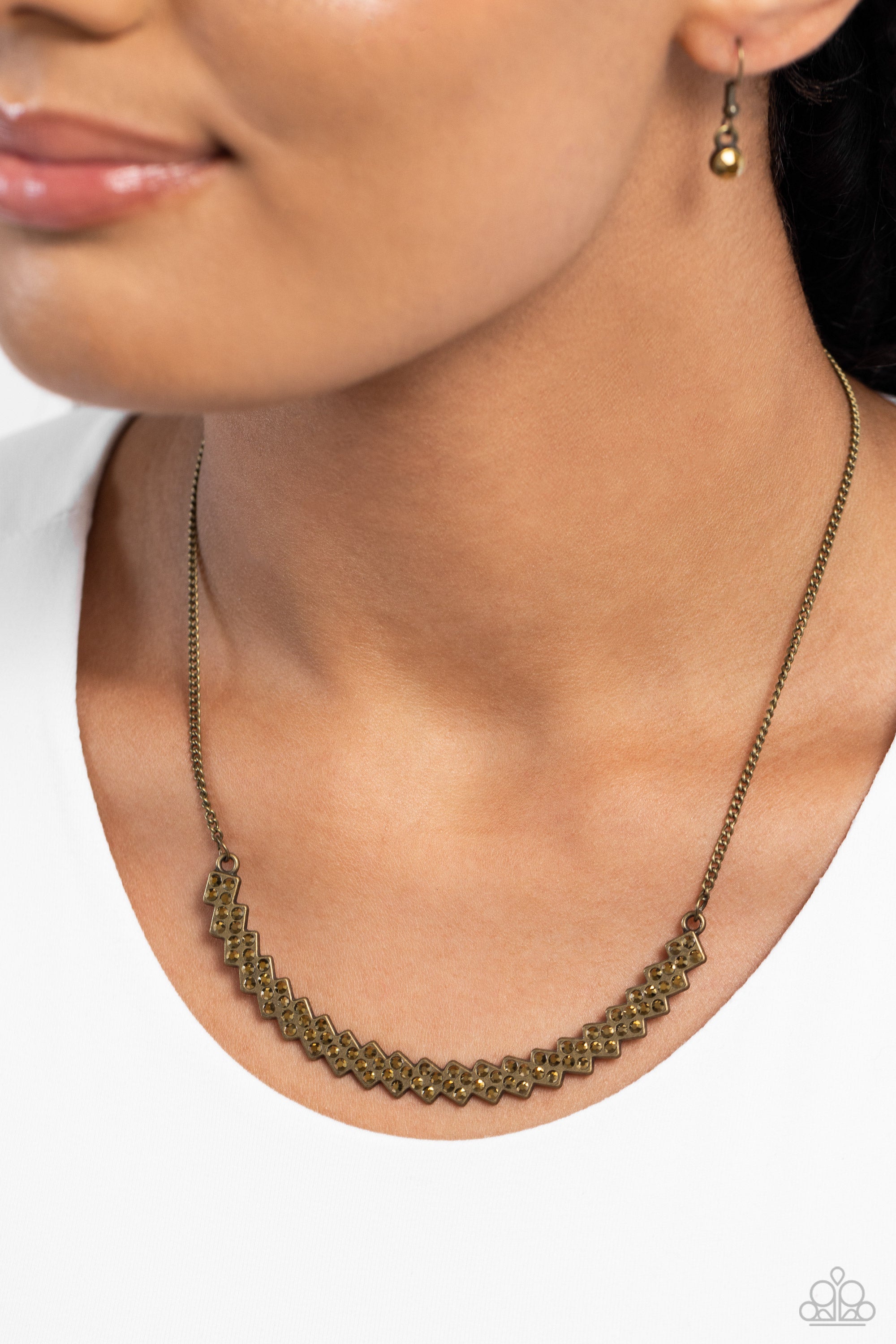 DICEY DEMURE BRASS-NECKLACE